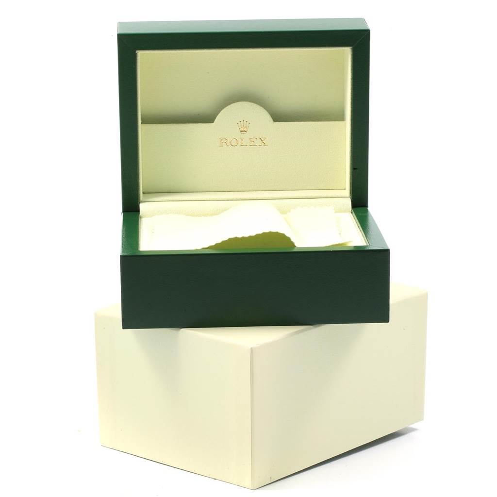 This is an open green Rolex Datejust 41 116334 Men
s Stainless Steel Blue Dial 116334 Men
s Stainless Steel Blue Dial watch box with the Rolex logo inside, sitting on a cream-colored outer box.