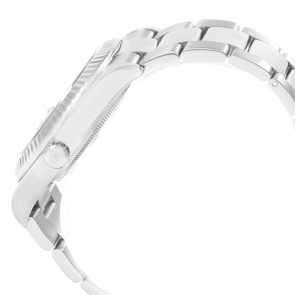 This image shows a side view of the Rolex Datejust 41 116334 Men's Stainless Steel Blue Dial 116334 Men's Stainless Steel Blue Dial watch, displaying the crown and part of the bracelet.