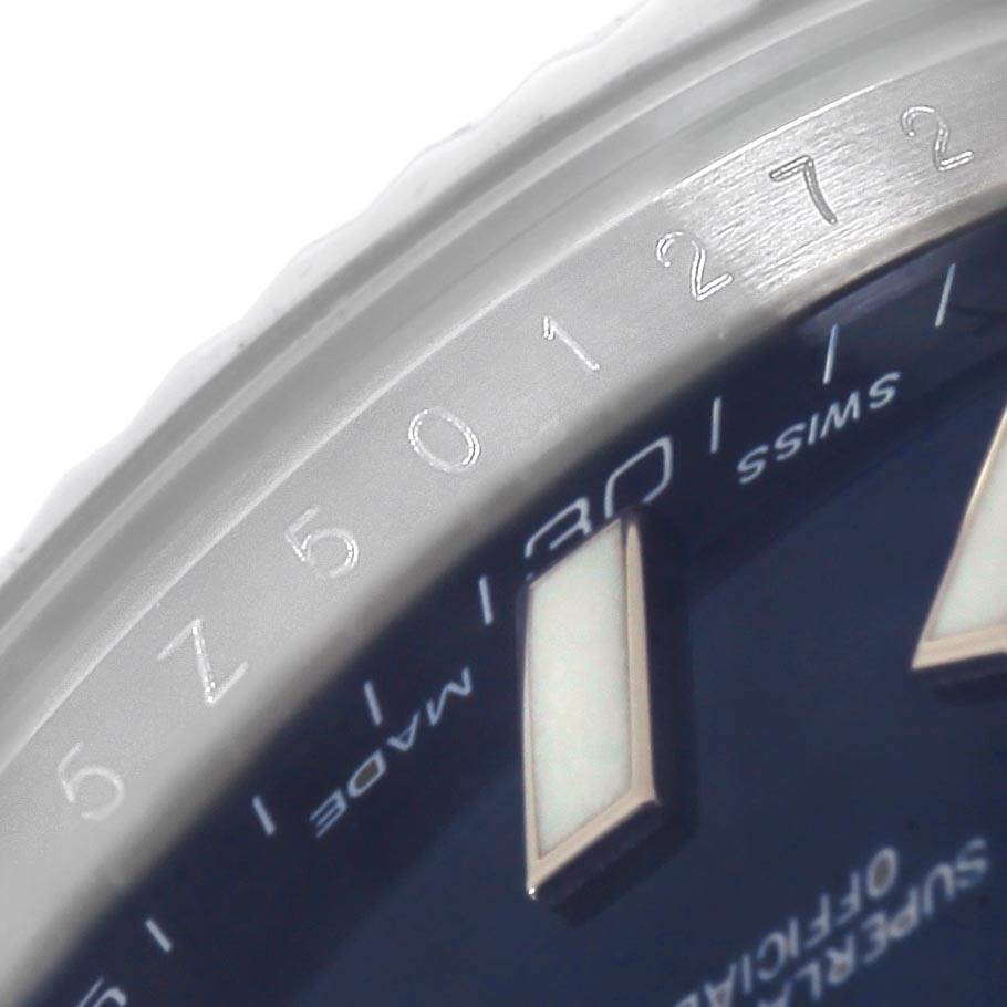 The image shows a close-up view of the dial and engraved bezel of the Rolex Datejust 41 116334 Men's Stainless Steel Blue Dial 116334 Men's Stainless Steel Blue Dial watch.