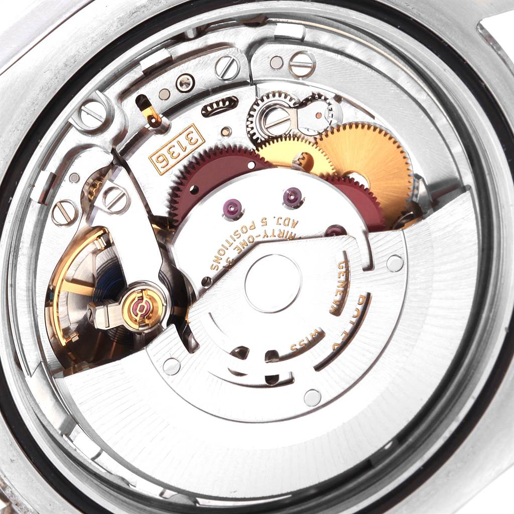 This image shows a close-up view of the Rolex Datejust 41 116300 Men's Stainless Steel Black Dial 116300 Men's Stainless Steel Black Dial's intricate internal movement mechanism.