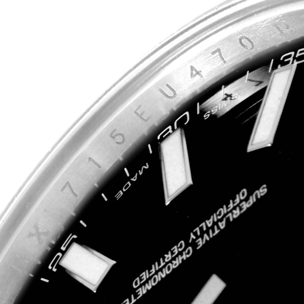 This close-up image shows a section of the dial and edge of the bezel for the Rolex Datejust 41 116300 Men's Stainless Steel Black Dial 116300 Men's Stainless Steel Black Dial watch.