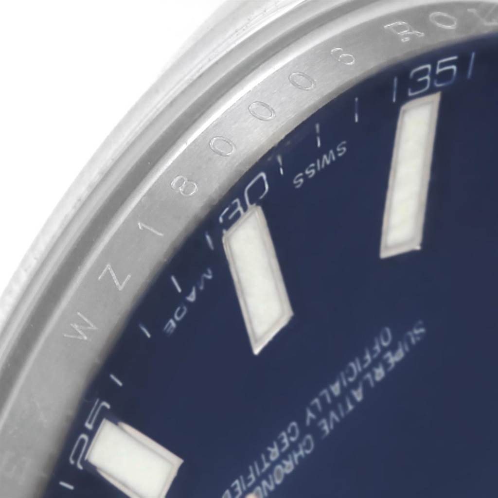 The image shows a close-up of the dial and bezel of a Rolex Datejust 41 116300 Men
s Stainless Steel Blue Dial 116300 Men
s Stainless Steel Blue Dial watch, displaying hour markers and part of the chapter ring.