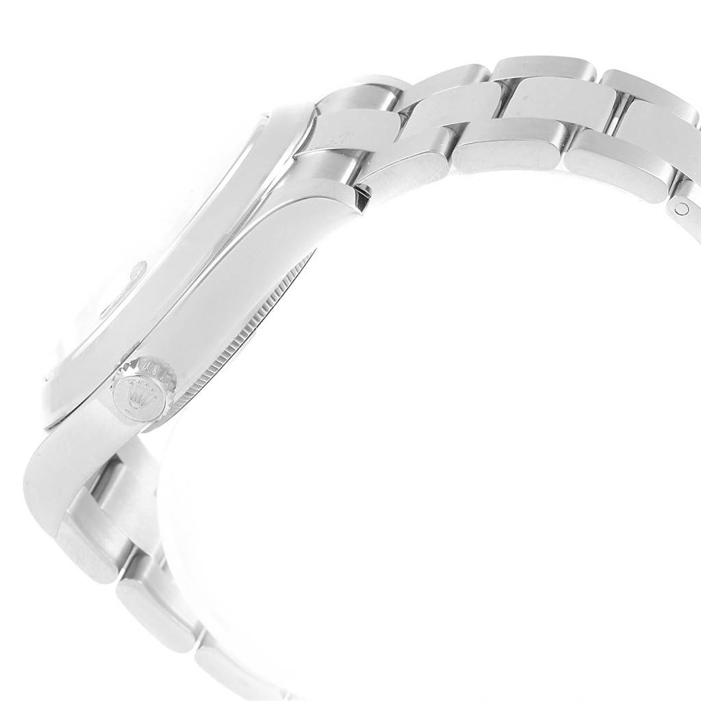 This image shows a side view of the Rolex Datejust 41 116300 Men
s Stainless Steel Blue Dial 116300 Men
s Stainless Steel Blue Dial, showcasing the crown and part of the bracelet.