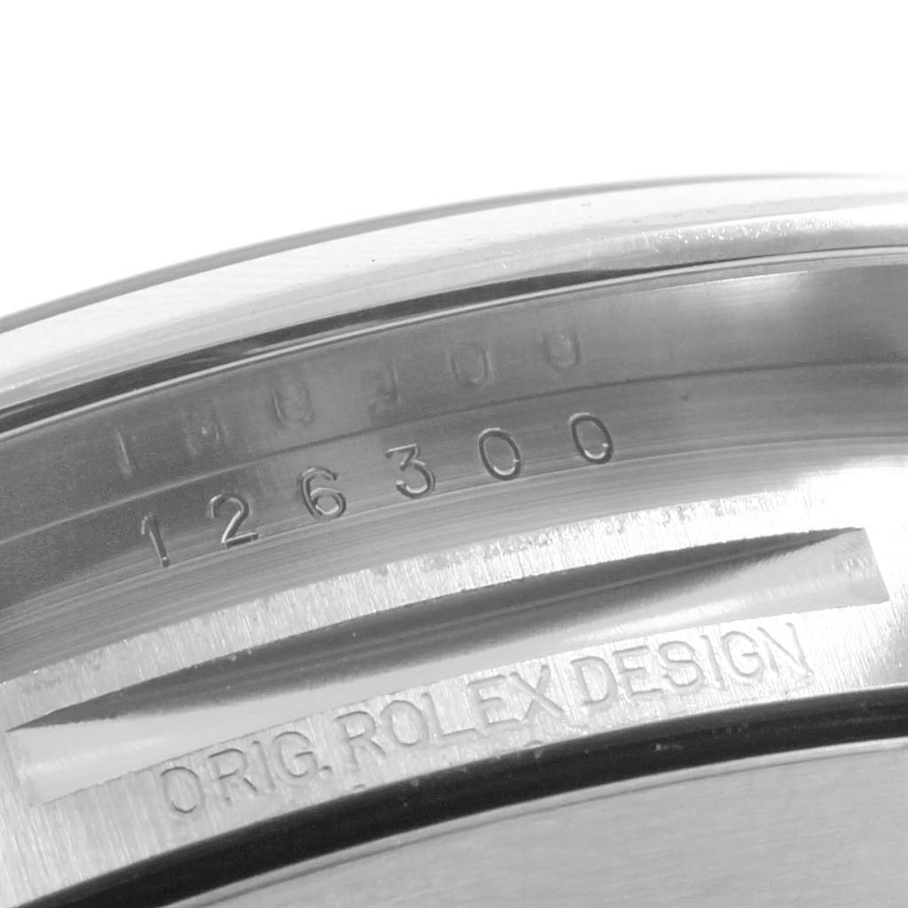 The image shows the case back of a Rolex Datejust 41 126300 Men's Stainless Steel White Dial 126300 Men's Stainless Steel White Dial with the model number 126300 and the engraving "Orig. Rolex Design."
