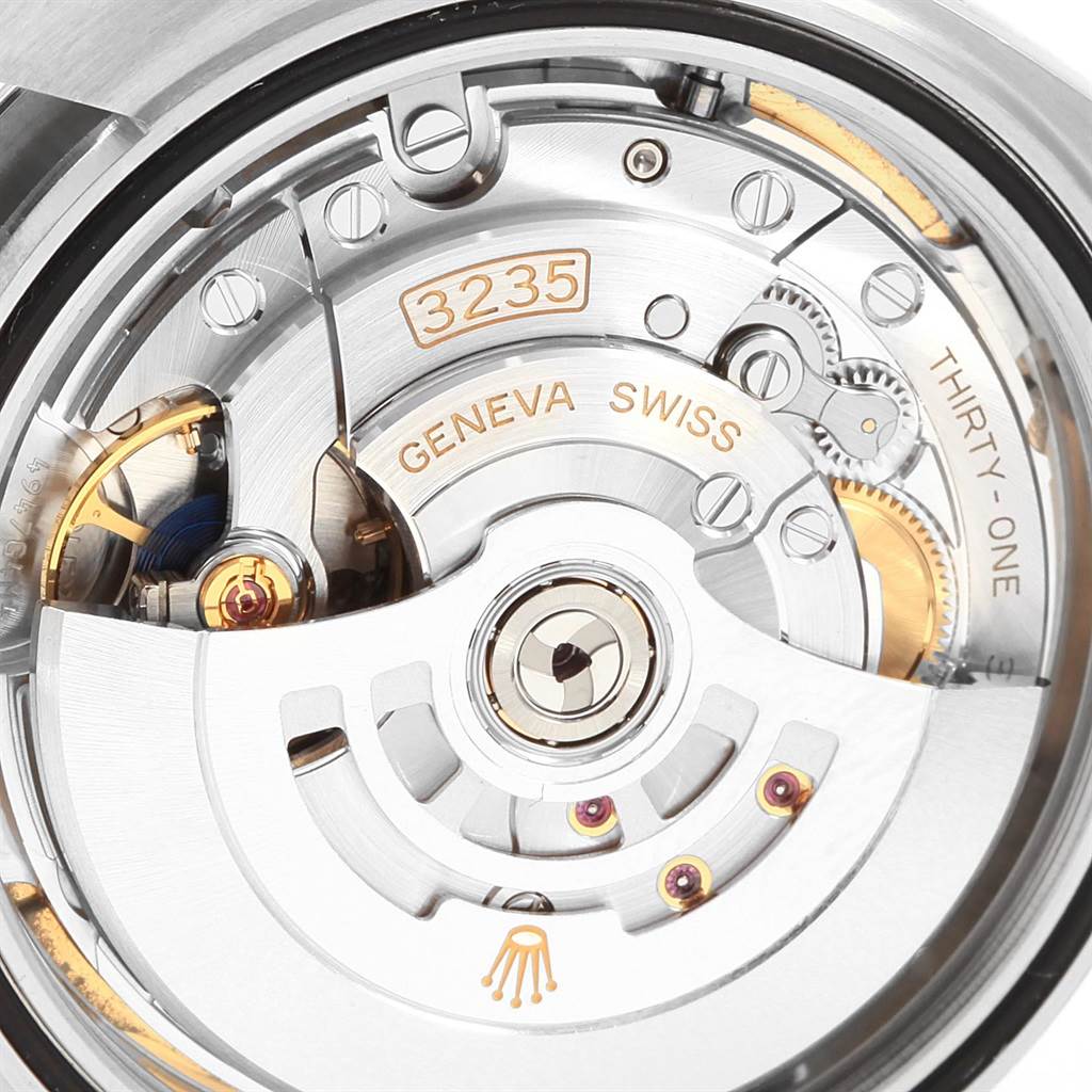 This is a close-up of the movement mechanism inside a Rolex Datejust 41 126300 Men's Stainless Steel White Dial 126300 Men's Stainless Steel White Dial watch, showcasing the intricate components.