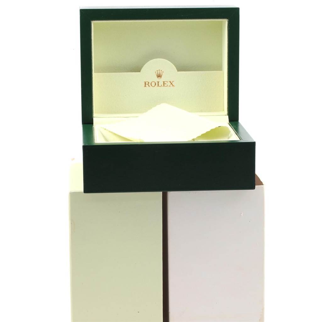 The image shows an open green and cream Rolex Datejust 41 126334 Men's Stainless Steel Grey Dial 126334 Men's Stainless Steel Grey Dial watch box with a cleaning cloth inside, viewed from the front.