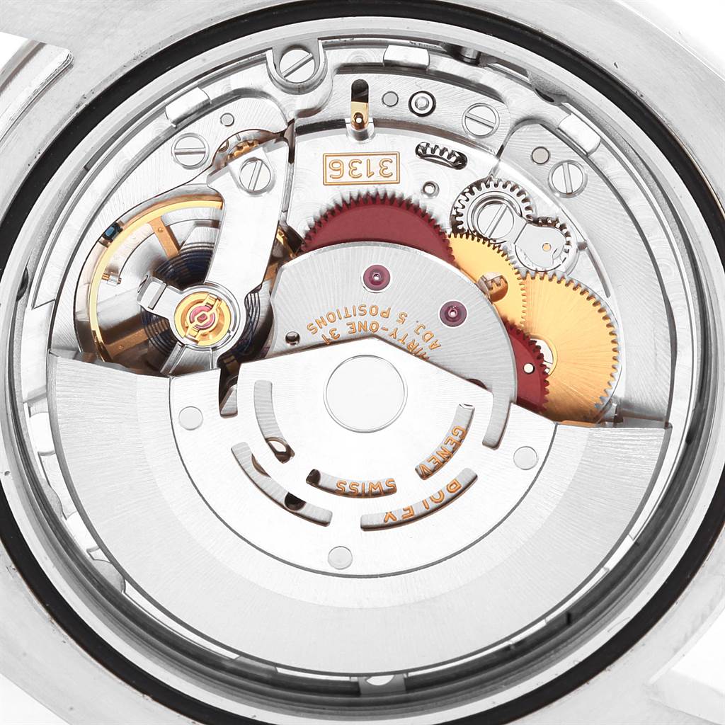 This image shows a close-up view of the movement inside a Rolex Datejust 41 116334 Men's Stainless Steel Blue Dial 116334 Men's Stainless Steel Blue Dial watch, highlighting its mechanical components.