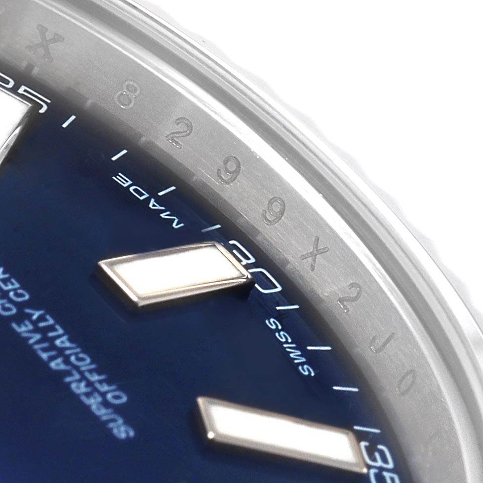 The image shows a close-up of the Datejust 41 model by Rolex, highlighting part of the dial and the engraved rehaut.