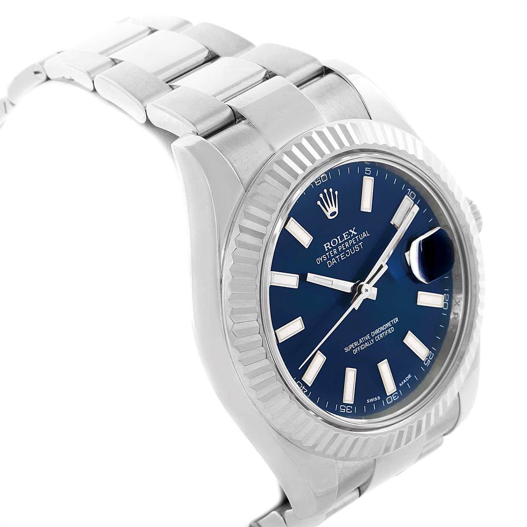 This image of the Rolex Datejust 41 116334 Men's Stainless Steel Blue Dial 116334 Men's Stainless Steel Blue Dial watch shows a side view of the stainless steel case, fluted bezel, bracelet, and blue dial.