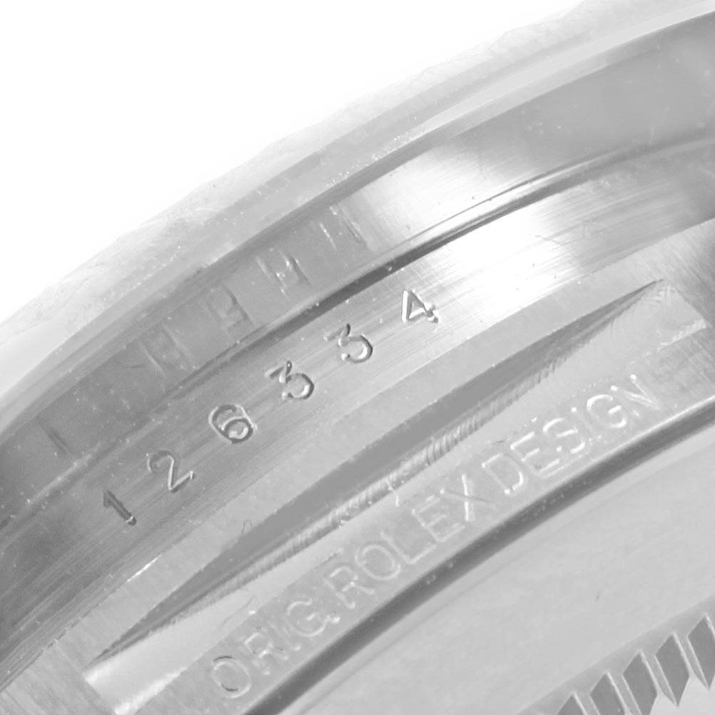 The image shows a close-up of the side engraving and serial number on the case of a Rolex Datejust 41 126334 Men's Stainless Steel Grey Dial 126334 Men's Stainless Steel Grey Dial watch.