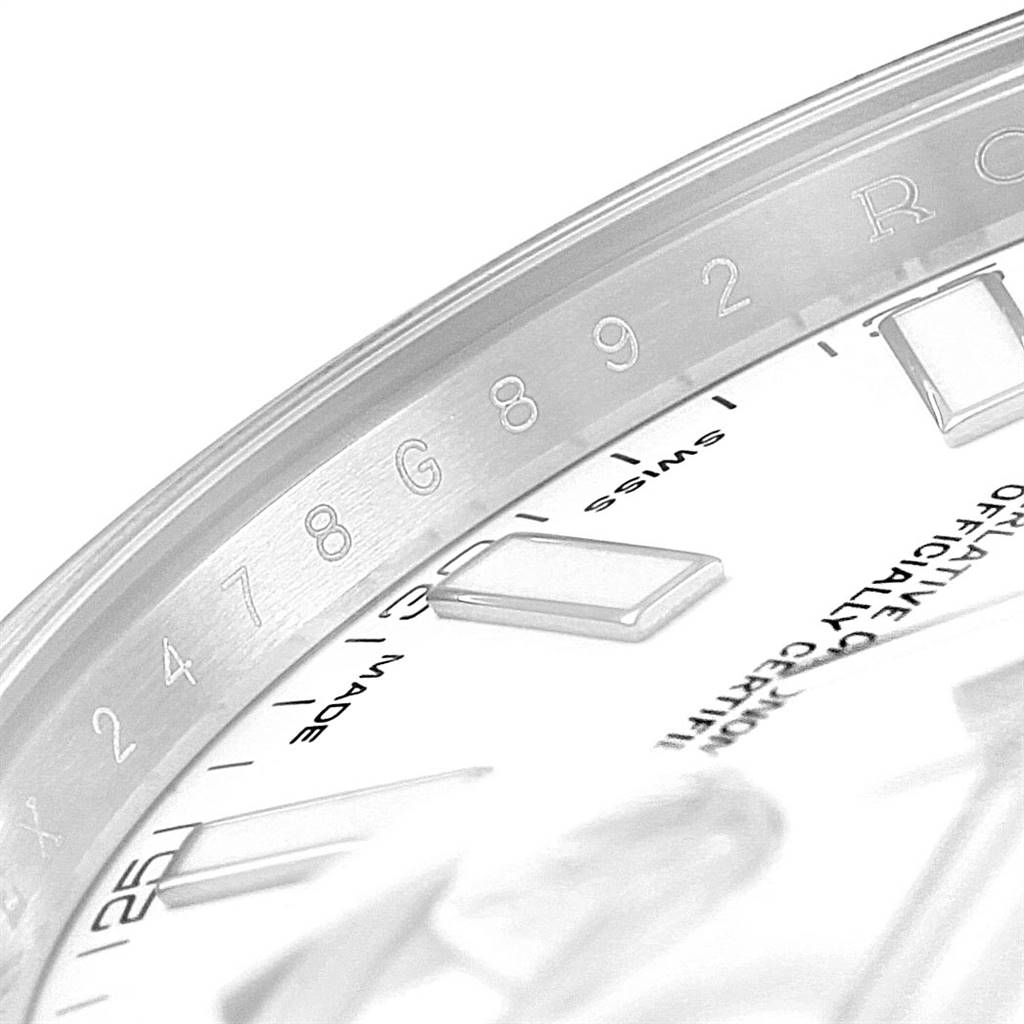 This close-up image shows part of the dial and chapter ring of a Rolex Datejust 41 116300 Men's Stainless Steel White Dial 116300 Men's Stainless Steel White Dial watch.