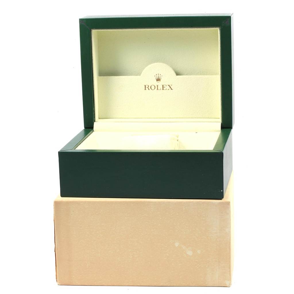 This image shows an open green Rolex box, likely for the Datejust 41 model, revealing the interior packaging.