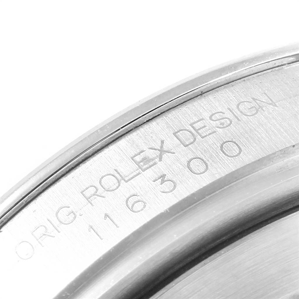 This image shows the inner case back edge of a Rolex Datejust 41 116300 Men's Stainless Steel White Dial 116300 Men's Stainless Steel White Dial, displaying the "ORIG. ROLEX DESIGN" engraving and reference number.