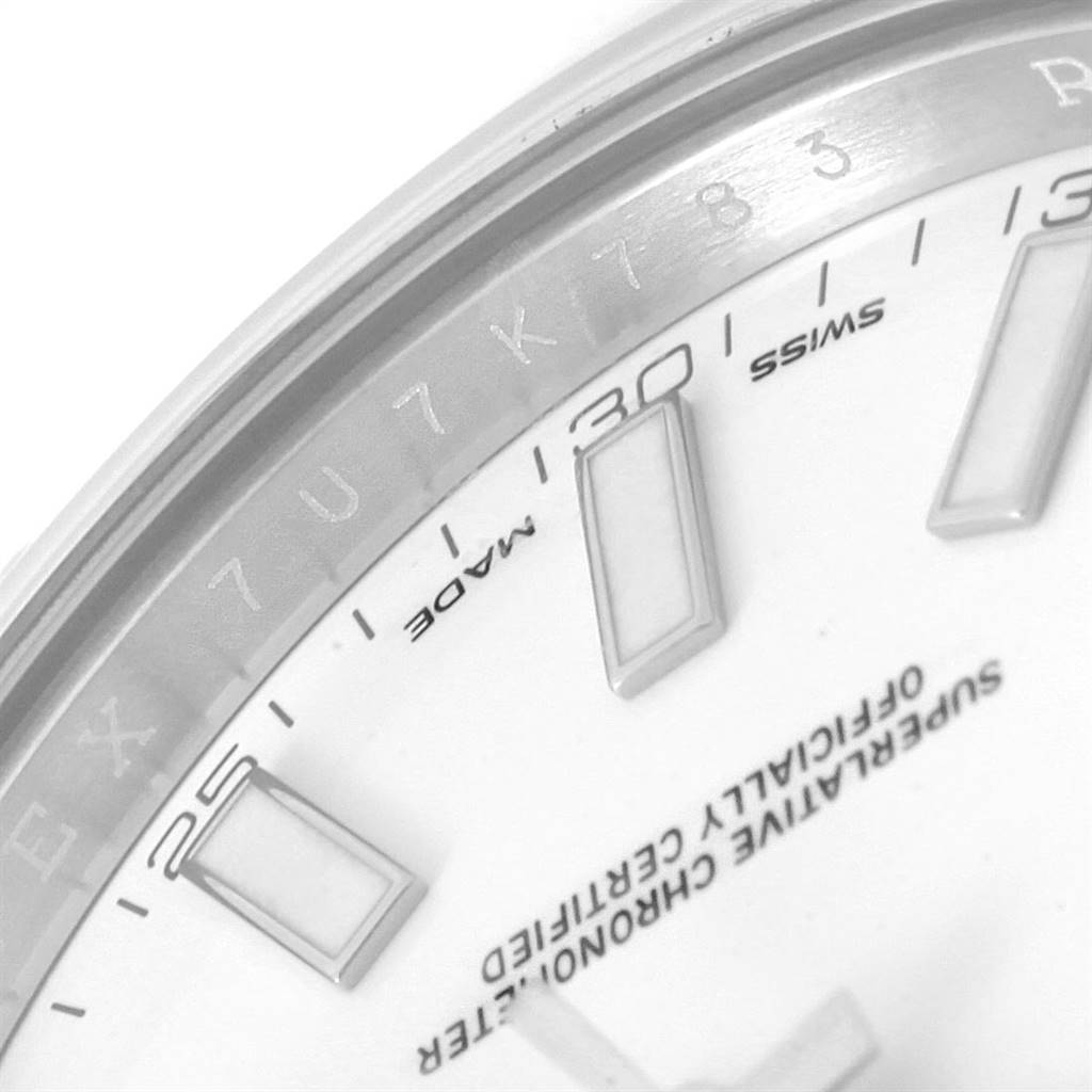 This image shows a close-up angle of the Rolex Datejust 41 116300 Men's Stainless Steel White Dial 116300 Men's Stainless Steel White Dial watch, focusing on the hour markers, text, and part of the bezel.