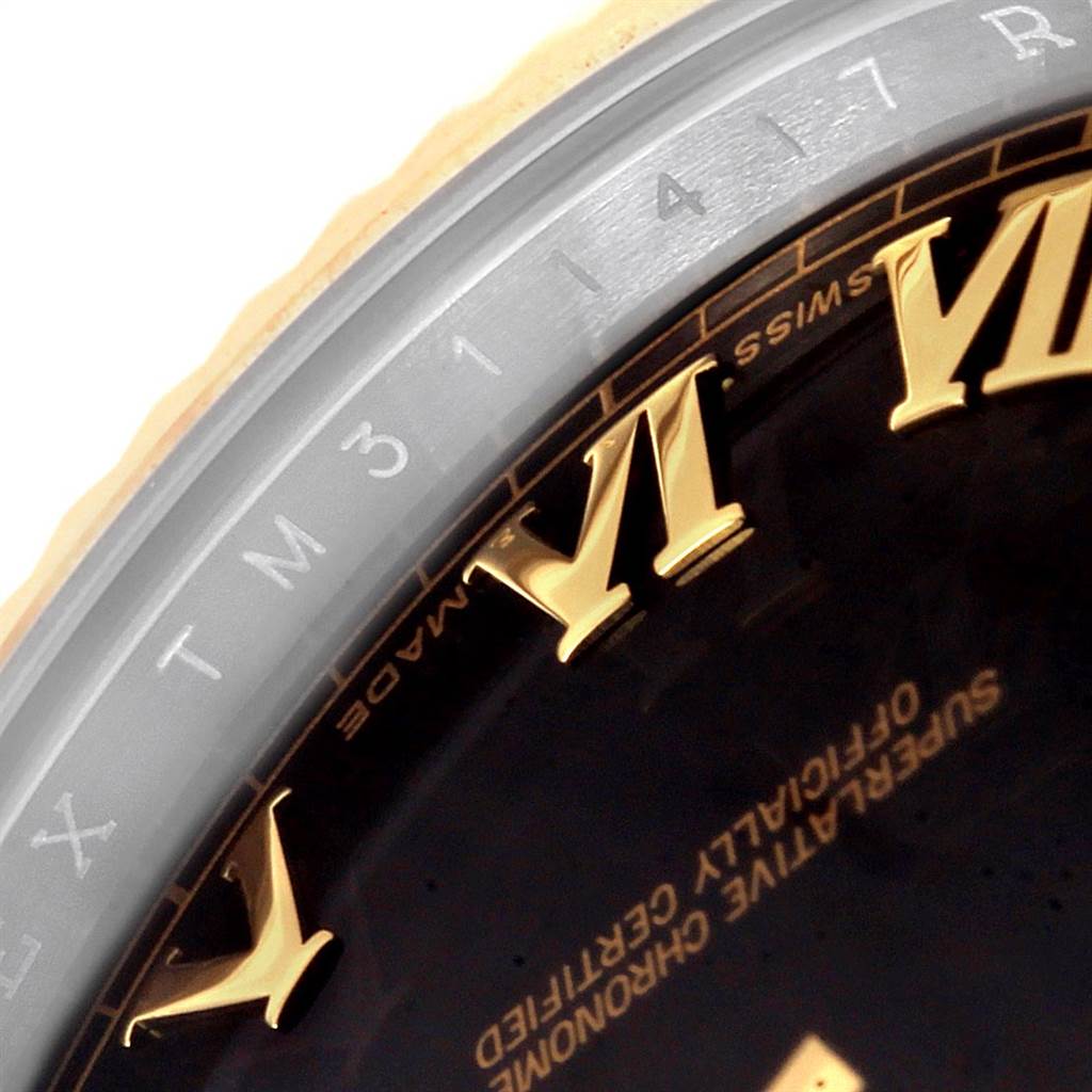 This close-up image shows the bezel and part of the dial of a Rolex Datejust 41 116333 Men's Steel and Gold (two tone) Black Dial 116333 Men's Steel and Gold (two tone) Black Dial watch, highlighting the Roman numerals and inscriptions.