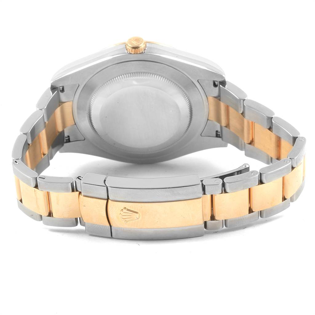 The image shows the back view of the Rolex Datejust 41 116333 Men's Steel and Gold (two tone) Black Dial 116333 Men's Steel and Gold (two tone) Black Dial watch, highlighting its bimetallic bracelet and the clasp with the Rolex logo.