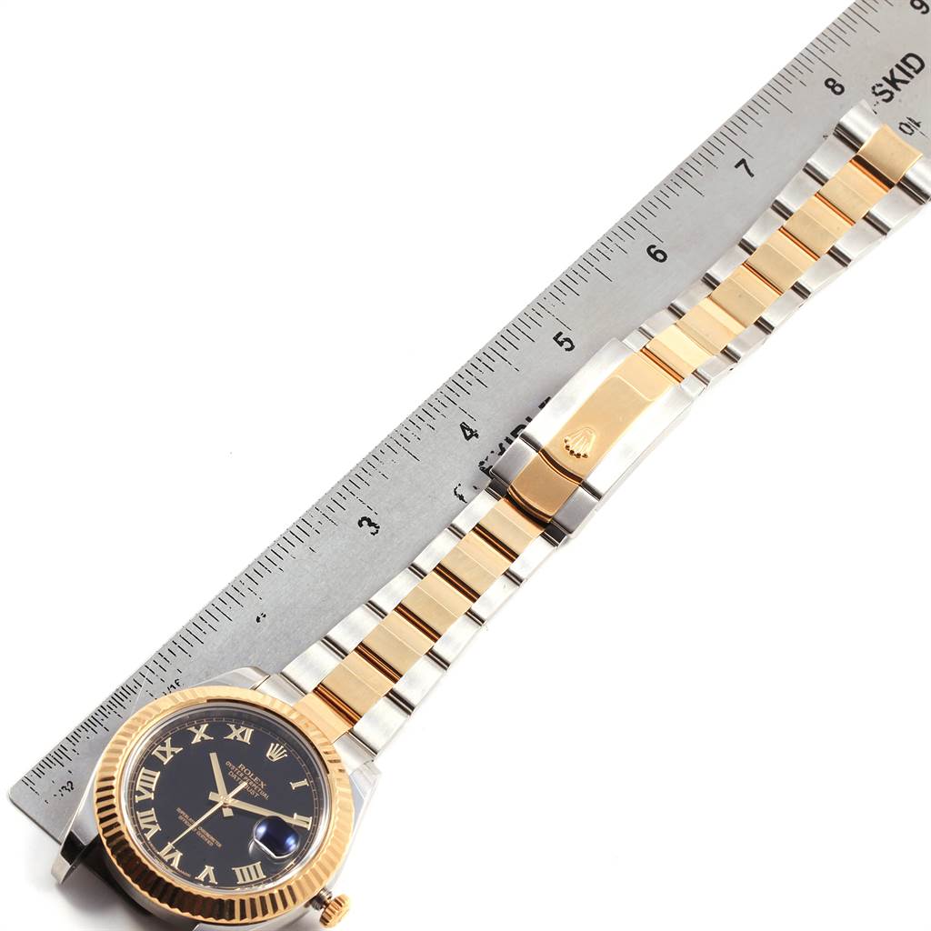 The image shows the front view of a Rolex Datejust 41 116333 Men's Steel and Gold (two tone) Black Dial 116333 Men's Steel and Gold (two tone) Black Dial watch with a ruler alongside for measurement.