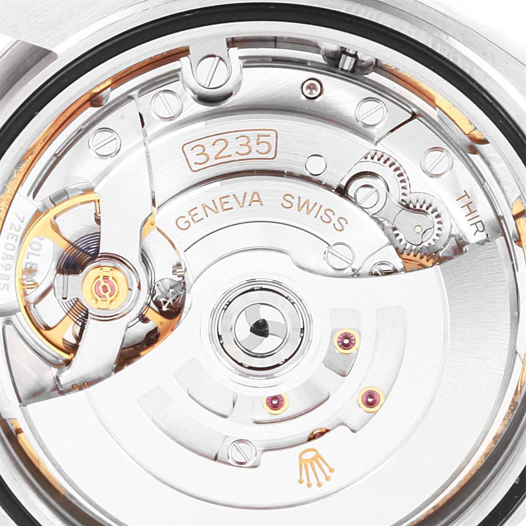 This image shows a close-up of the movement mechanism inside a Rolex Datejust 41 126300 Men's Stainless Steel White Dial 126300 Men's Stainless Steel White Dial watch.