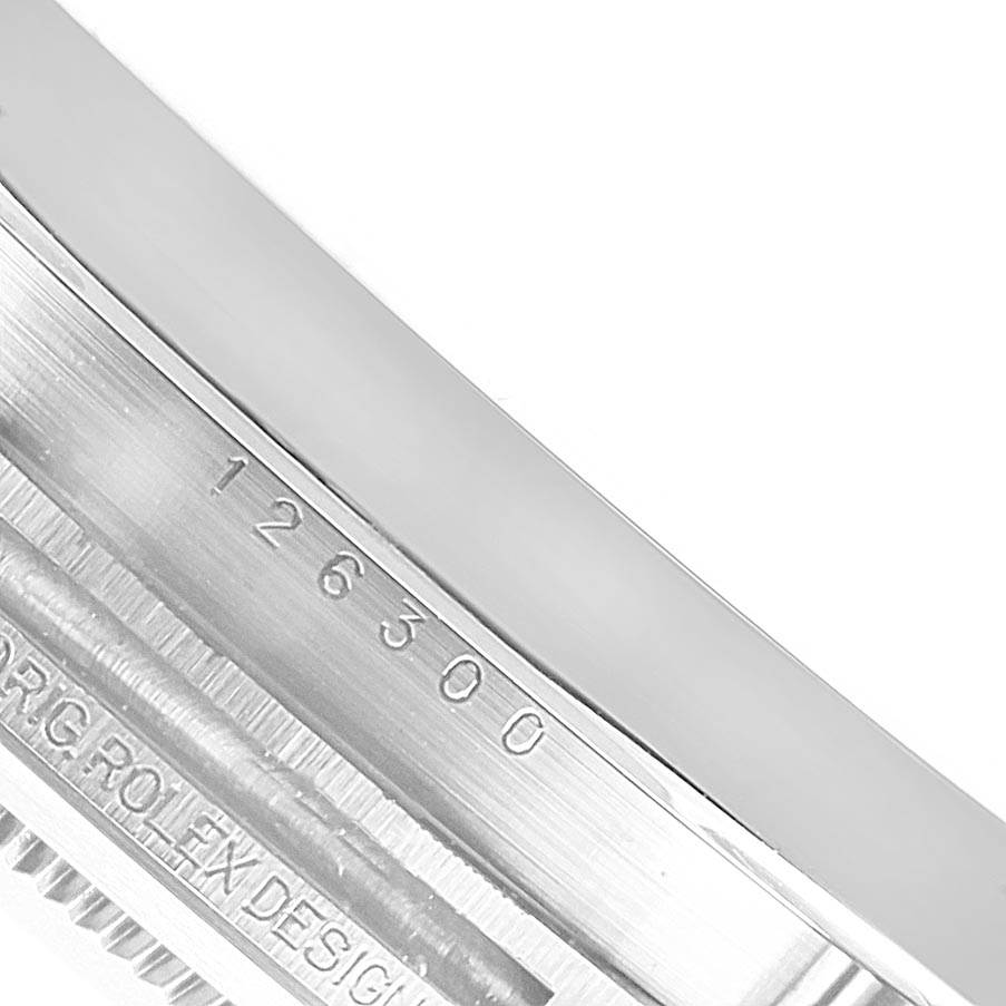 This image shows a close-up of the side of the case and serial number of a Rolex Datejust 41 126300 Men's Stainless Steel White Dial 126300 Men's Stainless Steel White Dial watch.