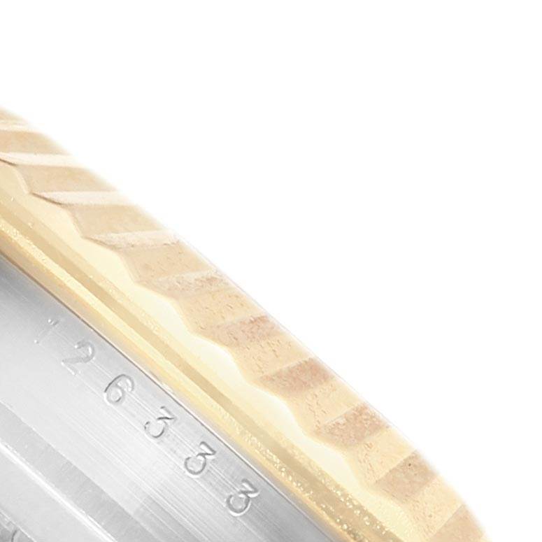 The image shows a close-up of the bezel and casing of a Rolex Datejust 41 126333 Men's Steel and Gold (two tone) White Dial 126333 Men's Steel and Gold (two tone) White Dial watch.