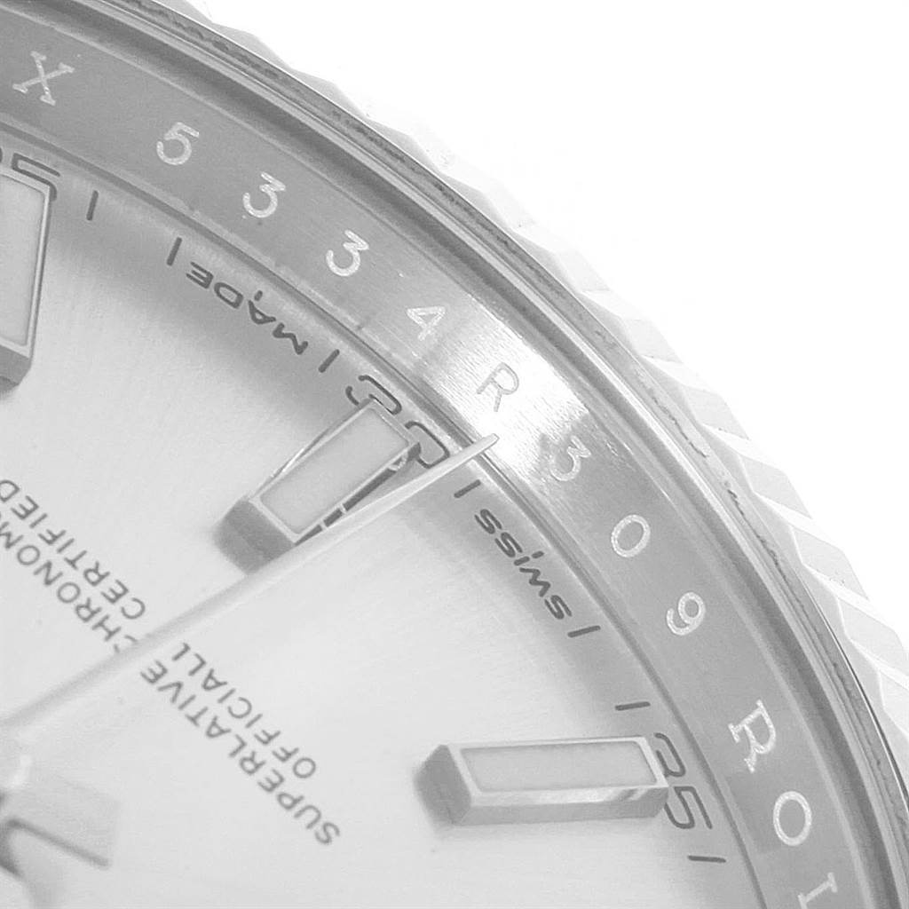 The image shows a close-up of the dial and bezel of a Rolex Datejust 41 126334 Men
s Stainless Steel Silver Dial 126334 Men
s Stainless Steel Silver Dial watch, highlighting the hour markers and surrounding text.