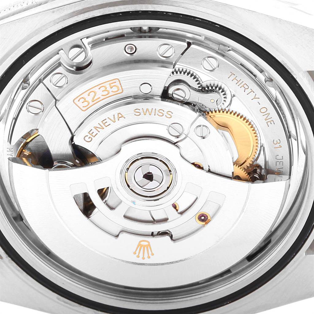 The image shows the Rolex Datejust 41 126334 Men
s Stainless Steel Silver Dial 126334 Men
s Stainless Steel Silver Dial model
s open case back, revealing the internal mechanical movement labeled "3235."