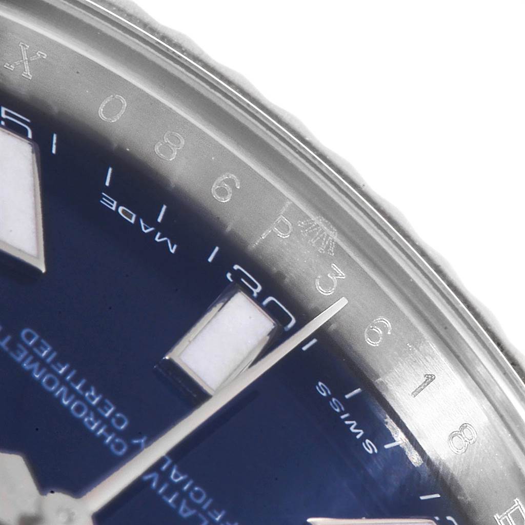 This close-up image features the edge of the dial and a portion of the bezel of a Rolex Datejust 41 116334 Men's Stainless Steel Blue Dial 116334 Men's Stainless Steel Blue Dial watch.