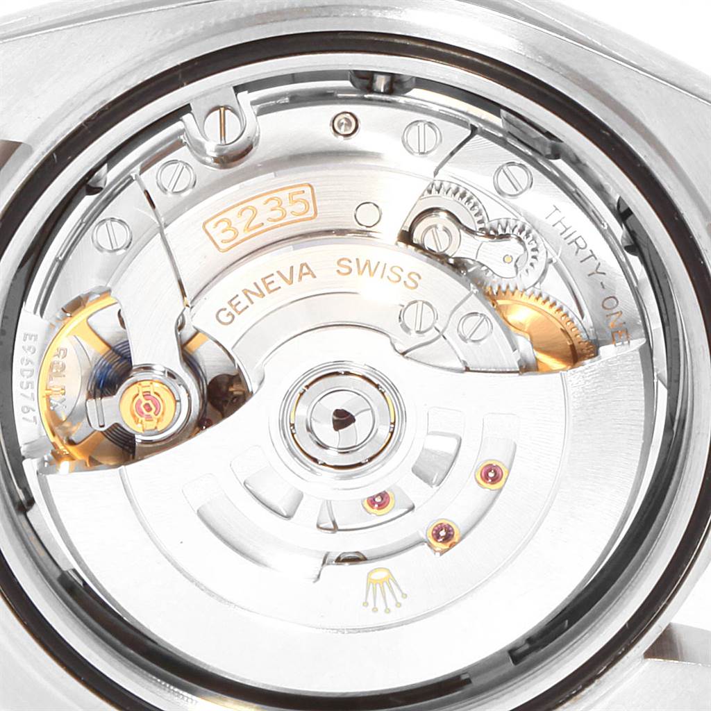 This image shows a close-up of the movement parts of a Rolex Datejust 41 126334 Men's Stainless Steel Grey Dial 126334 Men's Stainless Steel Grey Dial, revealing the intricate mechanical components.