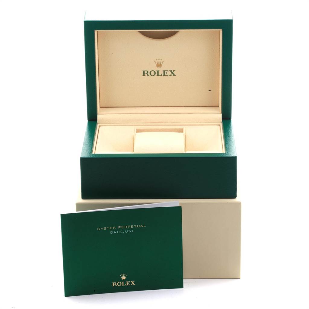 This image shows an open Rolex Datejust 41 116334 Men's Stainless Steel Grey Dial 116334 Men's Stainless Steel Grey Dial box with an instruction booklet in front of it.