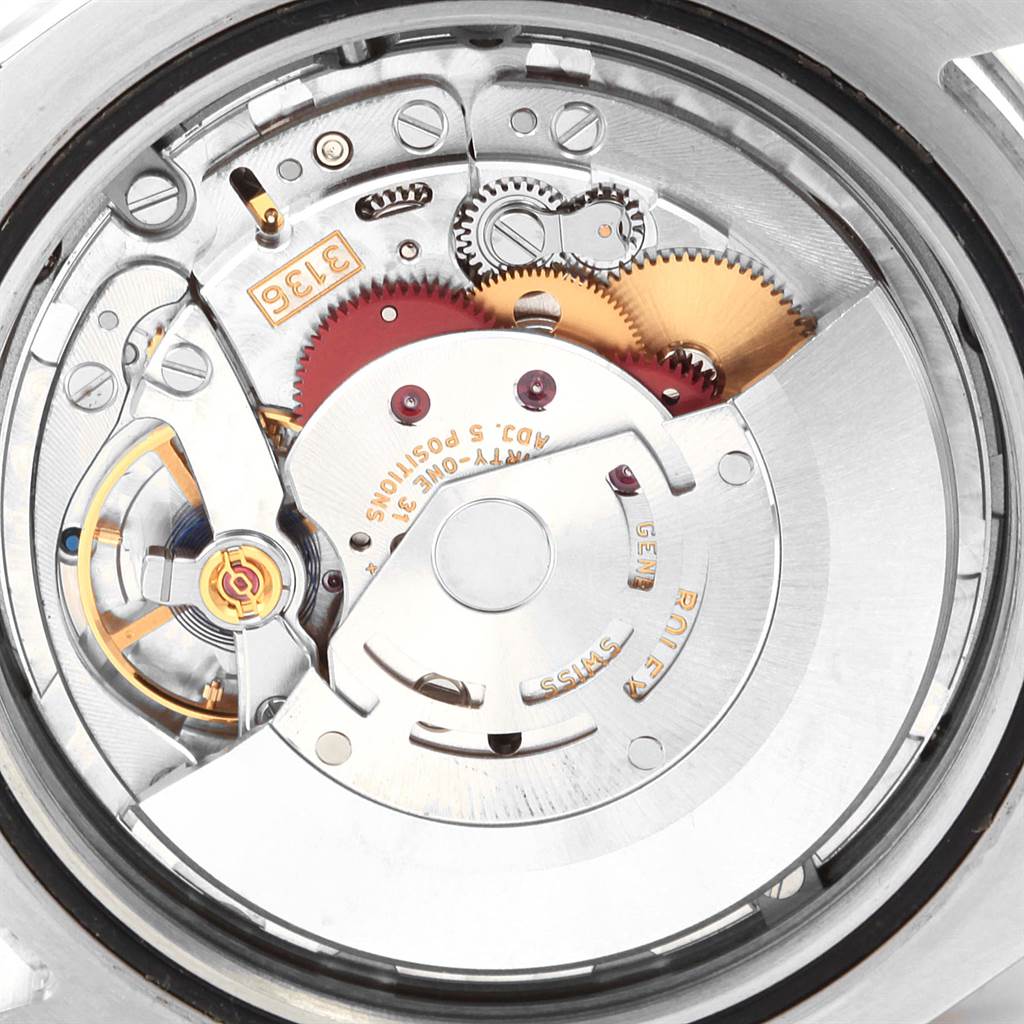 The image shows the intricate inner mechanism of the Rolex Datejust 41 116334 Men's Stainless Steel Grey Dial 116334 Men's Stainless Steel Grey Dial watch from an angled close-up view.