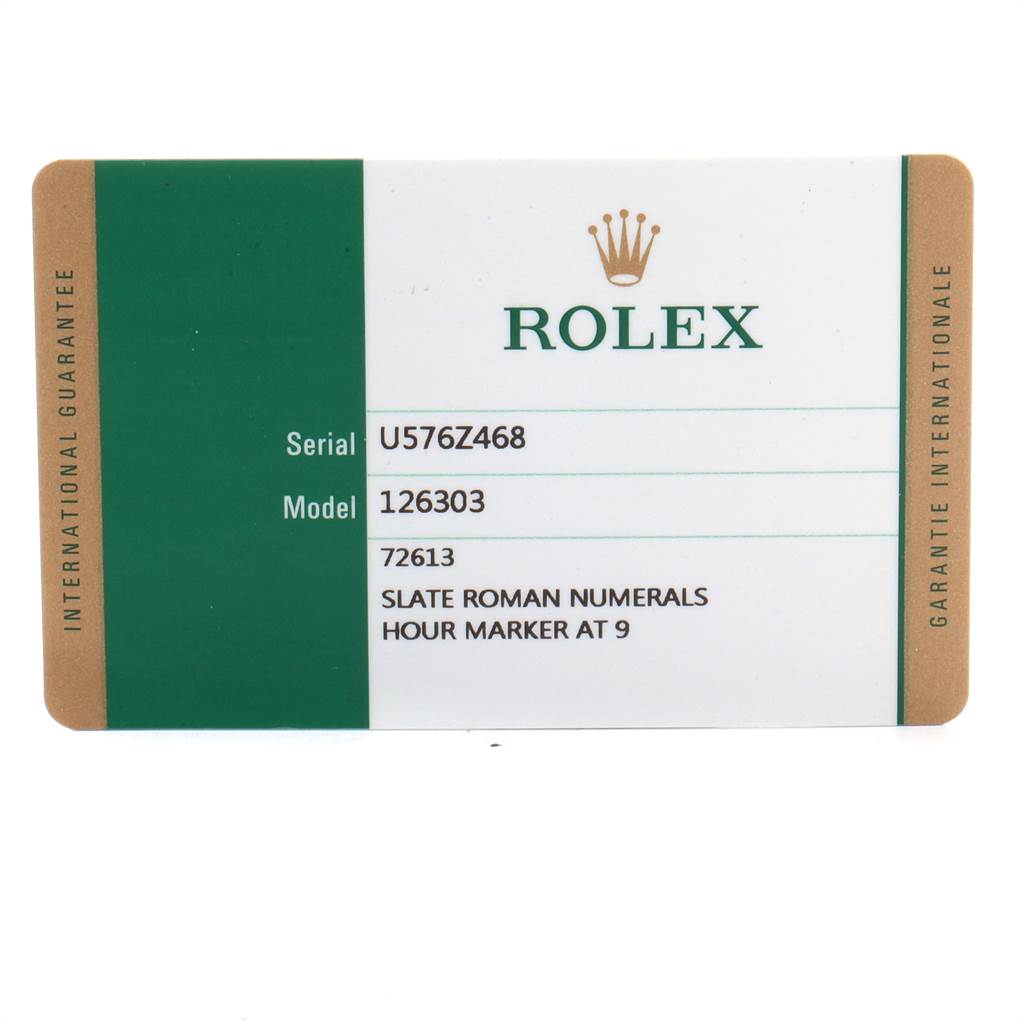 This image shows the international guarantee card for a Rolex Datejust 41 126303 Men's Steel and Gold (two tone) Grey Dial 126303 Men's Steel and Gold (two tone) Grey Dial model 126303.