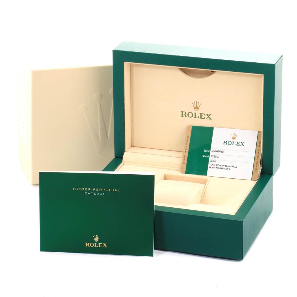 The image shows the packaging for a Rolex Datejust 41 126303 Men's Steel and Gold (two tone) Grey Dial 126303 Men's Steel and Gold (two tone) Grey Dial watch, including the box and accompanying documentation.