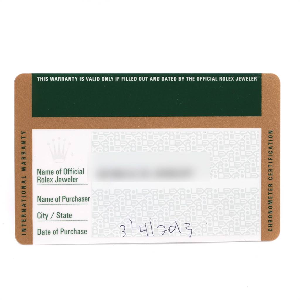 The image shows a Rolex international warranty card from an overhead angle for a Datejust 41 model.