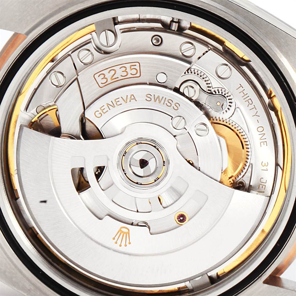 The image shows the movement mechanism of the Rolex Datejust 41 126301 Men
s Steel and Gold (two tone) Brown Dial 126301 Men
s Steel and Gold (two tone) Brown Dial watch, highlighting the 3235 caliber.