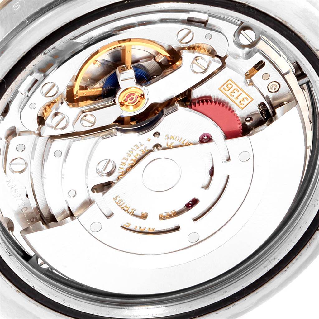 The image shows a close-up view of the movement and internal mechanisms of a Rolex Datejust 41 116334 Men's Stainless Steel Blue Dial 116334 Men's Stainless Steel Blue Dial watch.