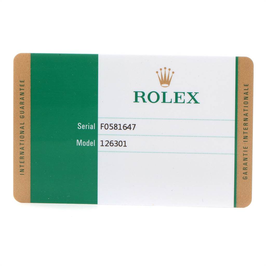 This image shows the international guarantee card for a Rolex Datejust 41 126301 Men's Steel and Gold (two tone) Brown Dial 126301 Men's Steel and Gold (two tone) Brown Dial model.