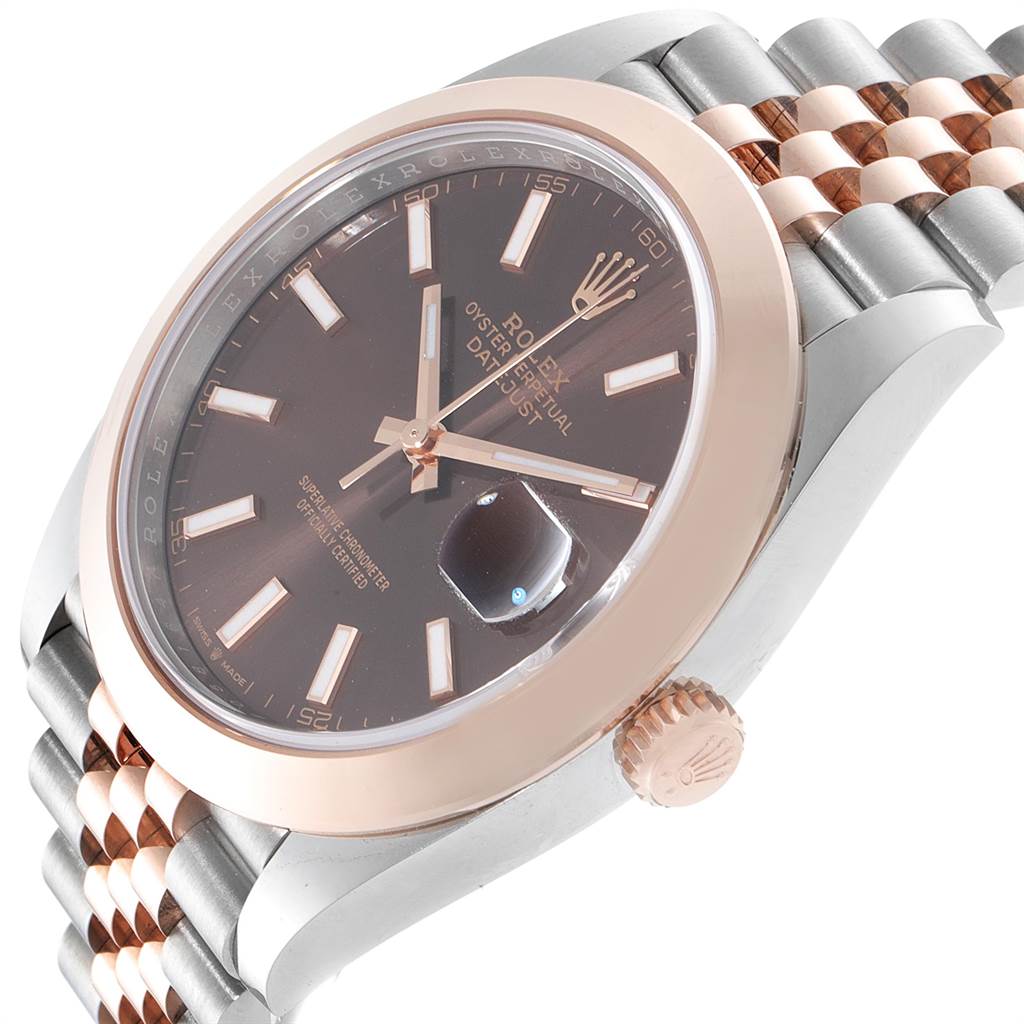 This image shows a side angle of the Rolex Datejust 41 126301 Men's Steel and Gold (two tone) Brown Dial 126301 Men's Steel and Gold (two tone) Brown Dial, highlighting the dial, bezel, crown, and part of the jubilee bracelet.