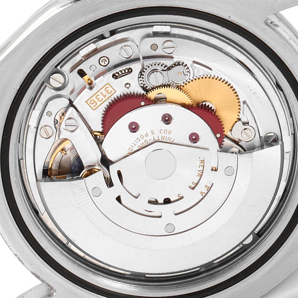 This image shows the intricate back view of the Rolex Datejust 41 116334 Men's Stainless Steel White Dial 116334 Men's Stainless Steel White Dial model's movement mechanism.