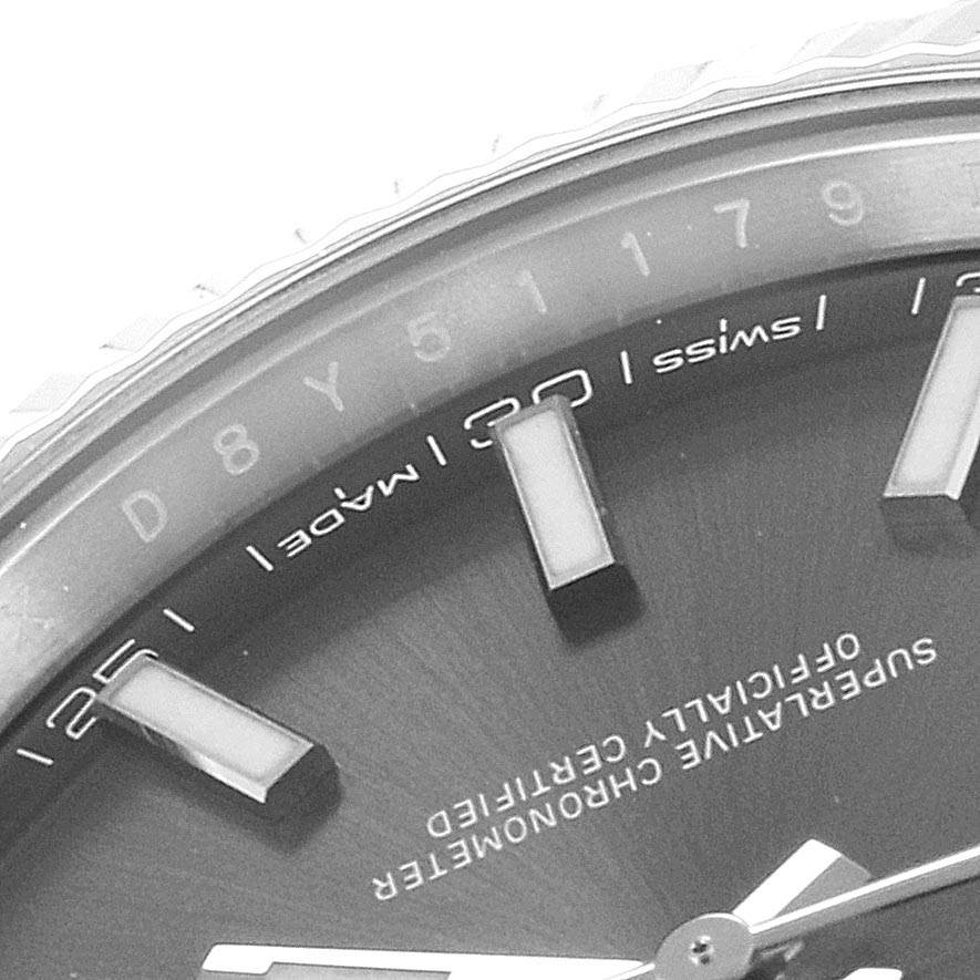 This is a close-up view of the dial and part of the bezel of a Rolex Datejust 41 126334 Men's Stainless Steel Grey Dial 126334 Men's Stainless Steel Grey Dial watch.