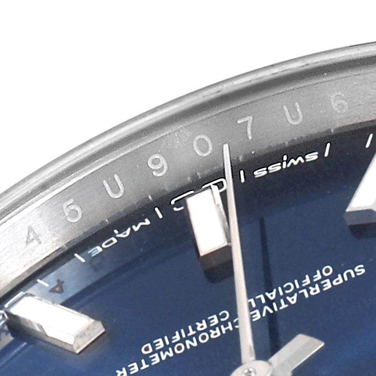 The image shows a close-up angle of the dial and hands of a Rolex Datejust 41 126300 Men's Stainless Steel Blue Dial 126300 Men's Stainless Steel Blue Dial, highlighting the markers and "Swiss Made" text.