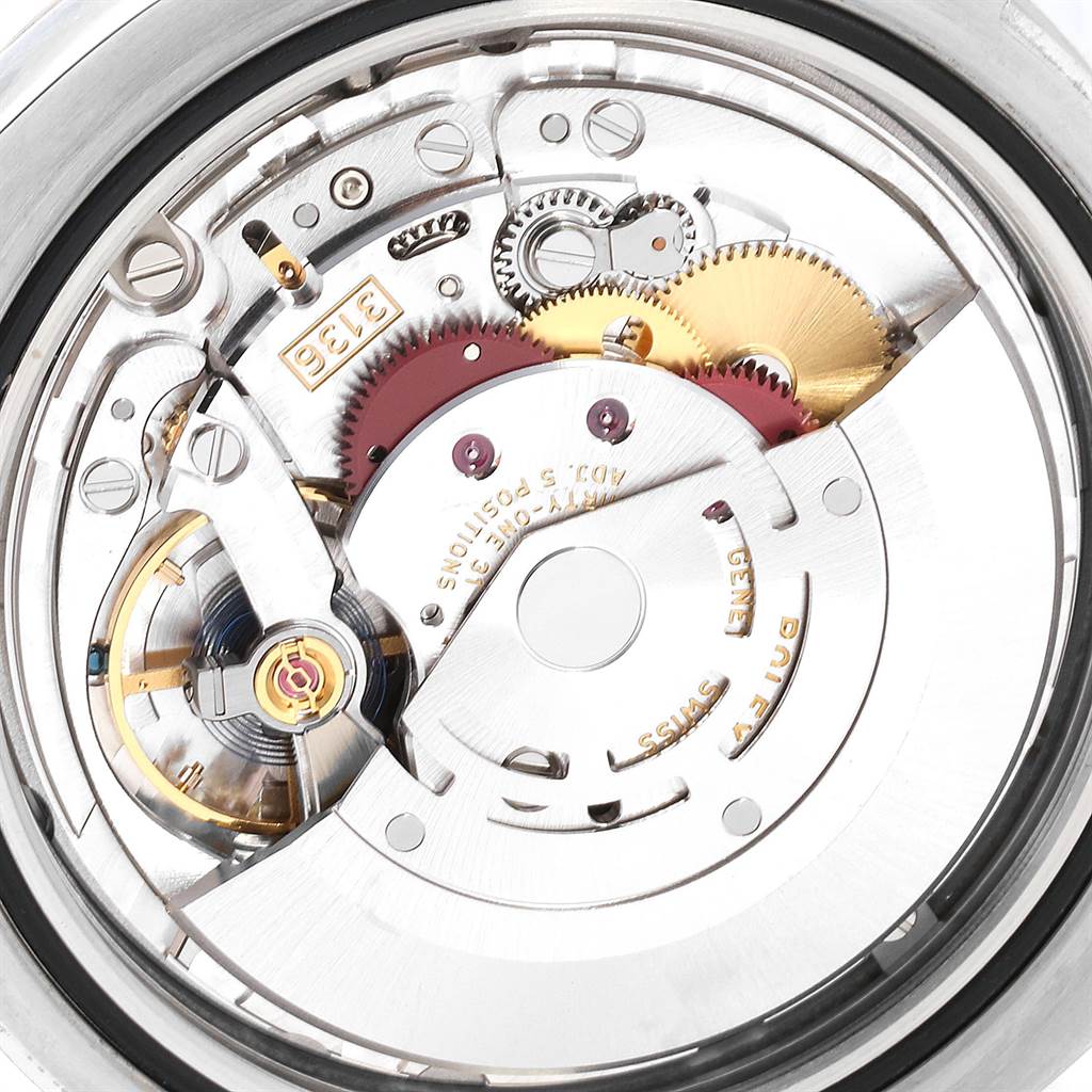 This image shows the intricately detailed internal mechanical movement of a Rolex Datejust 41 116334 Men's Stainless Steel Silver Dial 116334 Men's Stainless Steel Silver Dial watch.