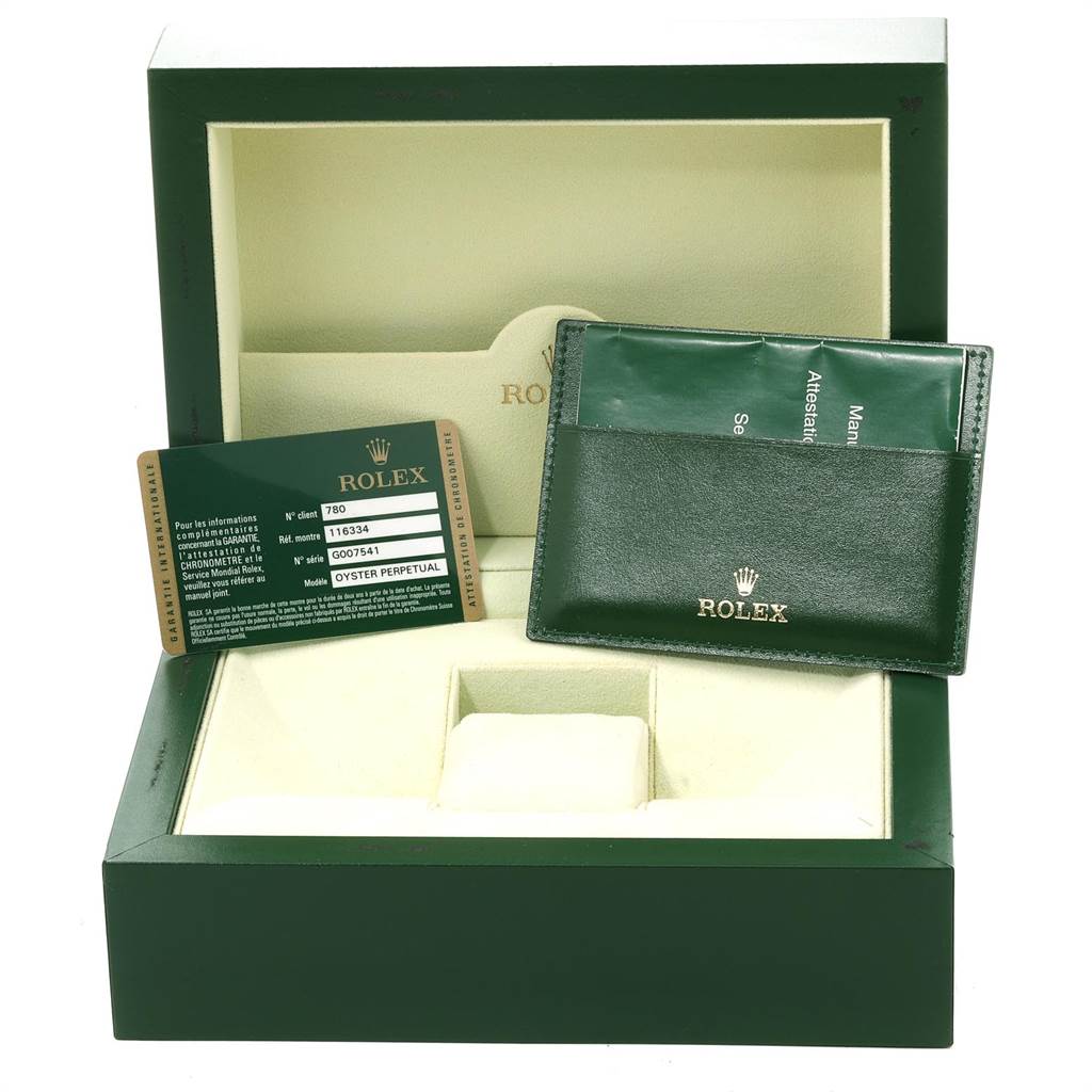 The image shows the green and cream box, wallet, and certification card for a Rolex Datejust 41 116334 Men's Stainless Steel Blue Dial 116334 Men's Stainless Steel Blue Dial.