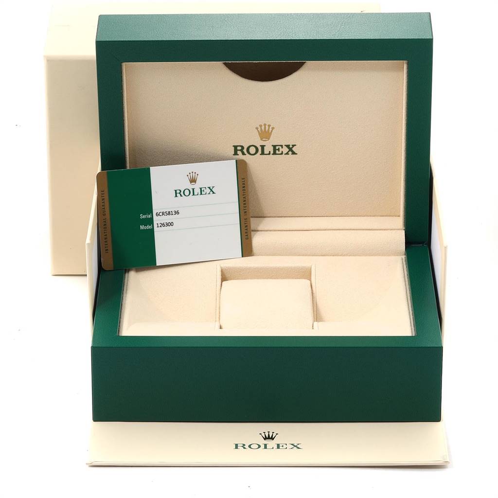 The image shows the open box of a Rolex Datejust 41 126300 Men's Stainless Steel Grey Dial 126300 Men's Stainless Steel Grey Dial model with an authenticity card placed inside.