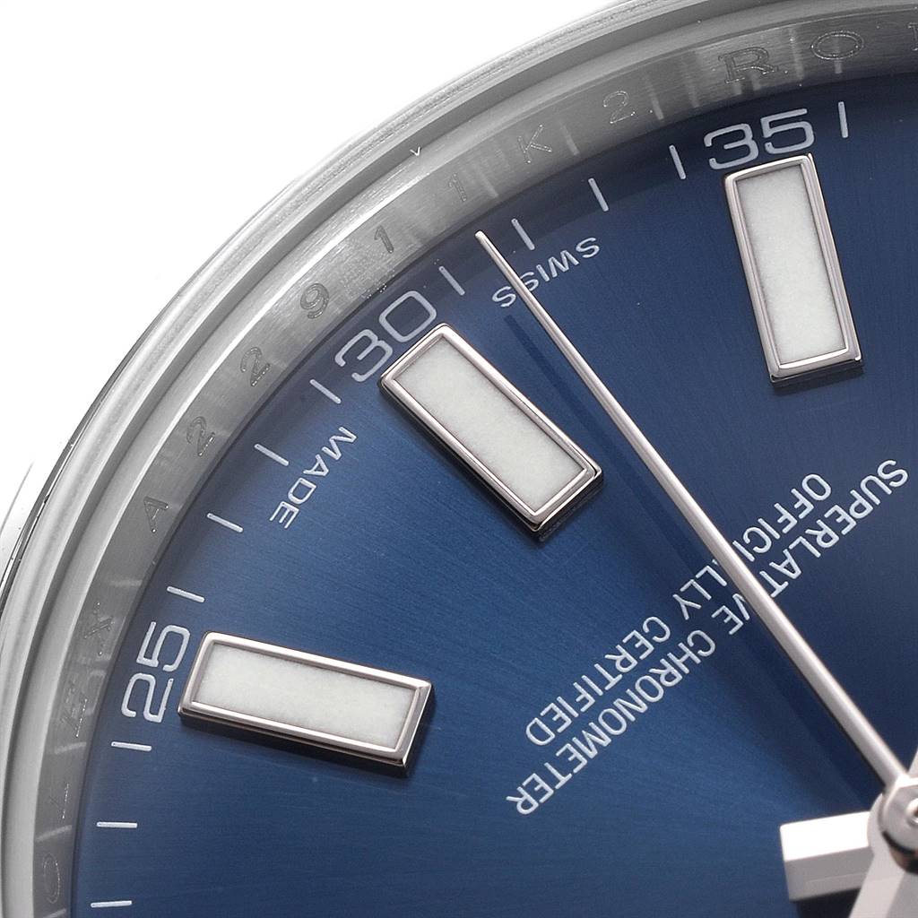The close-up image shows the dial and indices of the Rolex Datejust 41 116334 Men's Stainless Steel Blue Dial 116334 Men's Stainless Steel Blue Dial watch, highlighting its blue face and the 30-35 minute markers.