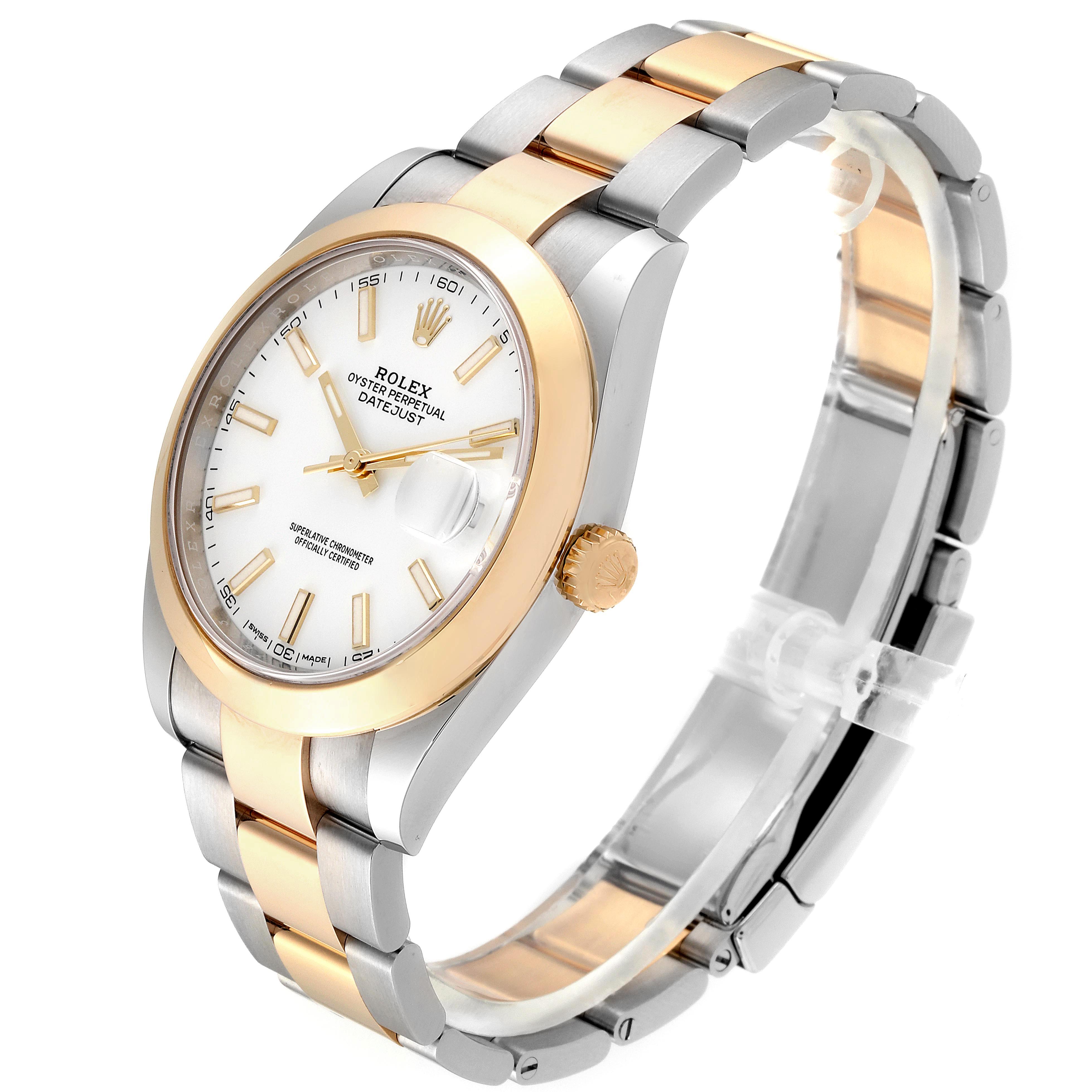 The Rolex Datejust 41 126303 Men's Steel and Gold (two tone) White Dial 126303 Men's Steel and Gold (two tone) White Dial watch is shown at an angled side view, highlighting its gold and silver bracelet and white dial.