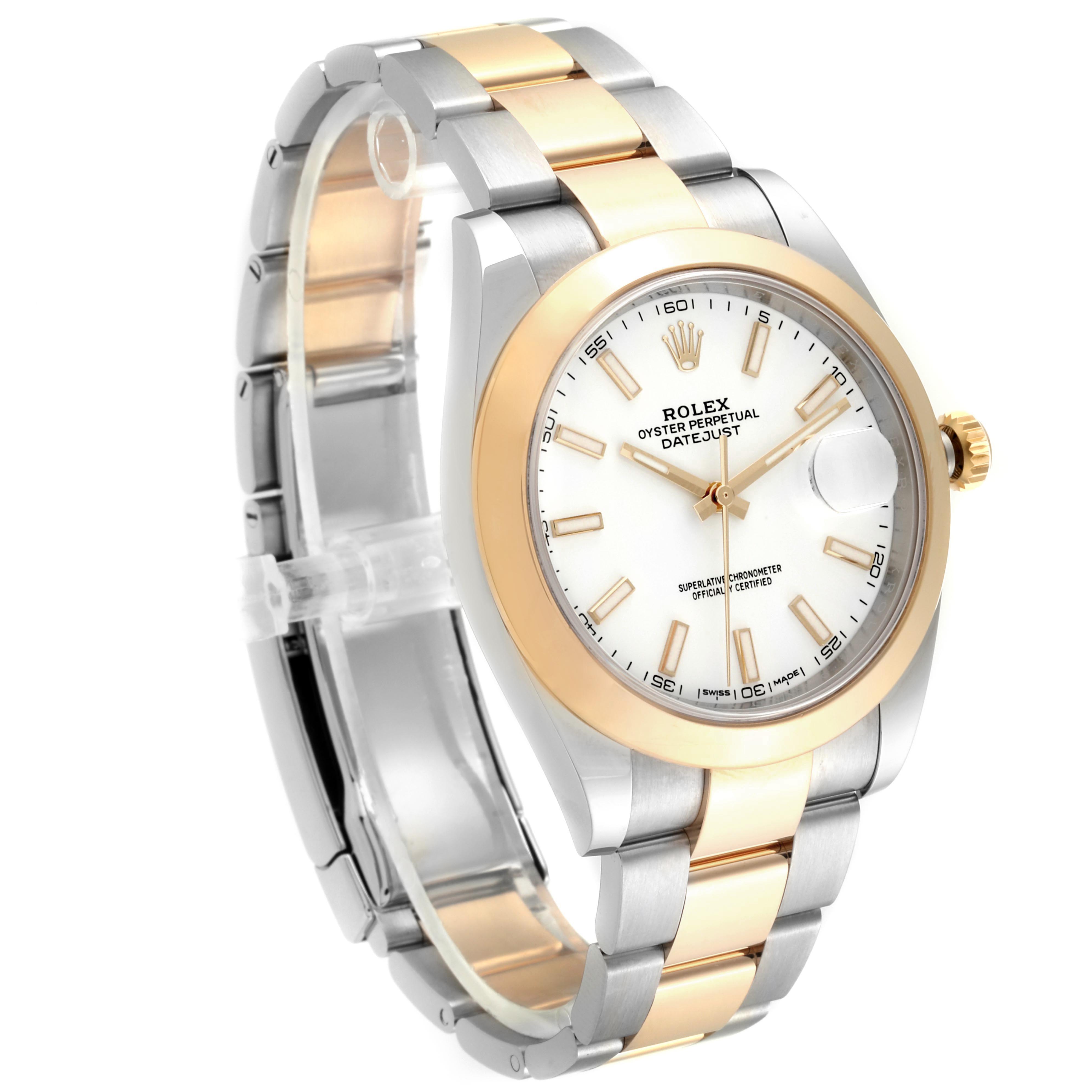 The image shows a Rolex Datejust 41 126303 Men's Steel and Gold (two tone) White Dial 126303 Men's Steel and Gold (two tone) White Dial model watch at a slight angle, highlighting its dial, bezel, and two-tone bracelet.