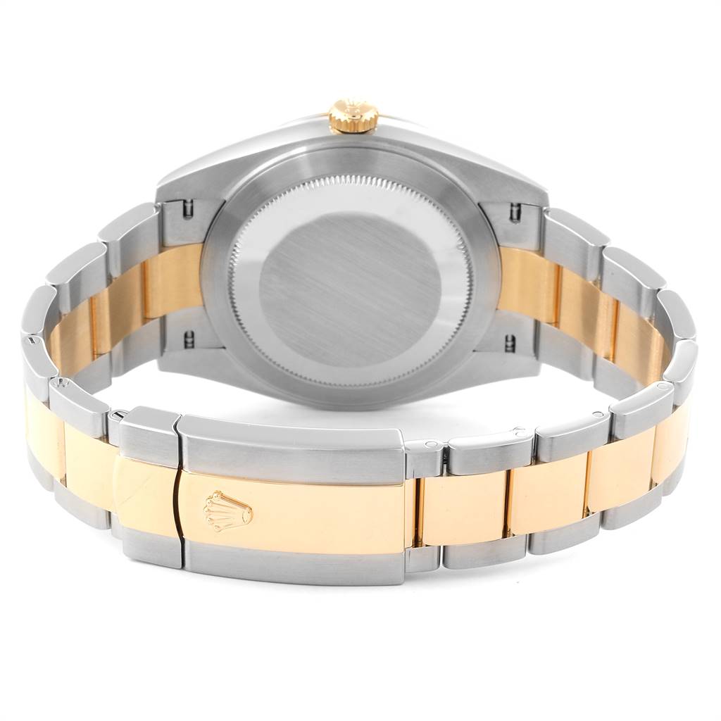 This image shows the back side of the Rolex Datejust 41 126303 Men's Steel and Gold (two tone) White Dial 126303 Men's Steel and Gold (two tone) White Dial watch, focusing on the case back and the two-tone bracelet with clasp.