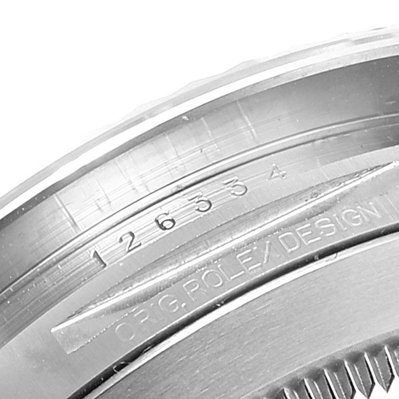 This image shows a close-up of the model and design engravings on the side of a Rolex Datejust 41 126334 Men's Stainless Steel Blue Dial 126334 Men's Stainless Steel Blue Dial watch casing.