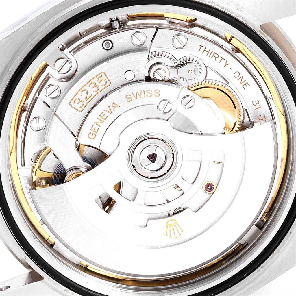 This close-up shows the movement mechanism of the Rolex Datejust 41 126334 Men's Stainless Steel Blue Dial 126334 Men's Stainless Steel Blue Dial from the back.