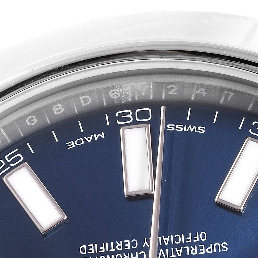 The image shows a close-up of the dial of a Rolex Datejust 41 116300 Men
s Stainless Steel Blue Dial 116300 Men
s Stainless Steel Blue Dial watch, capturing the markers and part of the bezel.